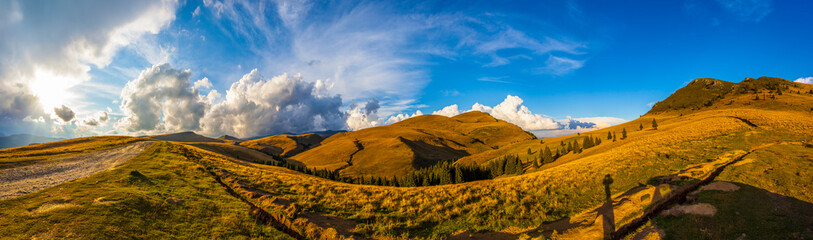 Fototapeta premium Outstanding panoramic view on Bucegi Mountains, Dichiu Peak, in a autumn day, Bucegi Natural Park, Romania