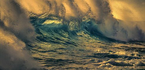 Storm in The ocean with Big waves and emerald sunset color on background