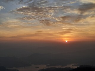 sunrise over the mountains in Adam's peak Sri Lanka