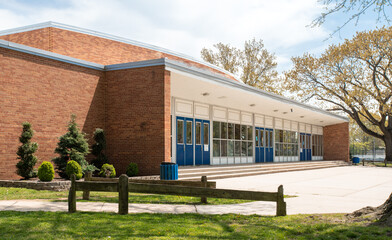 Exterior view of a typical American school building - 430863751