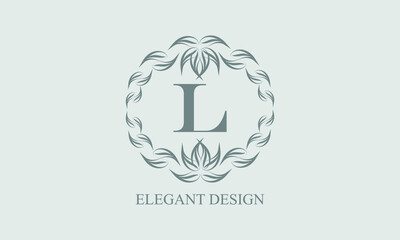 Elegant floral monogram with exquisite elements. Template for invitations, labels, business signs. Vintage ornament with calligraphic letter L.