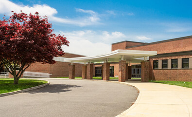 Exterior view of a typical American school building - 430863775