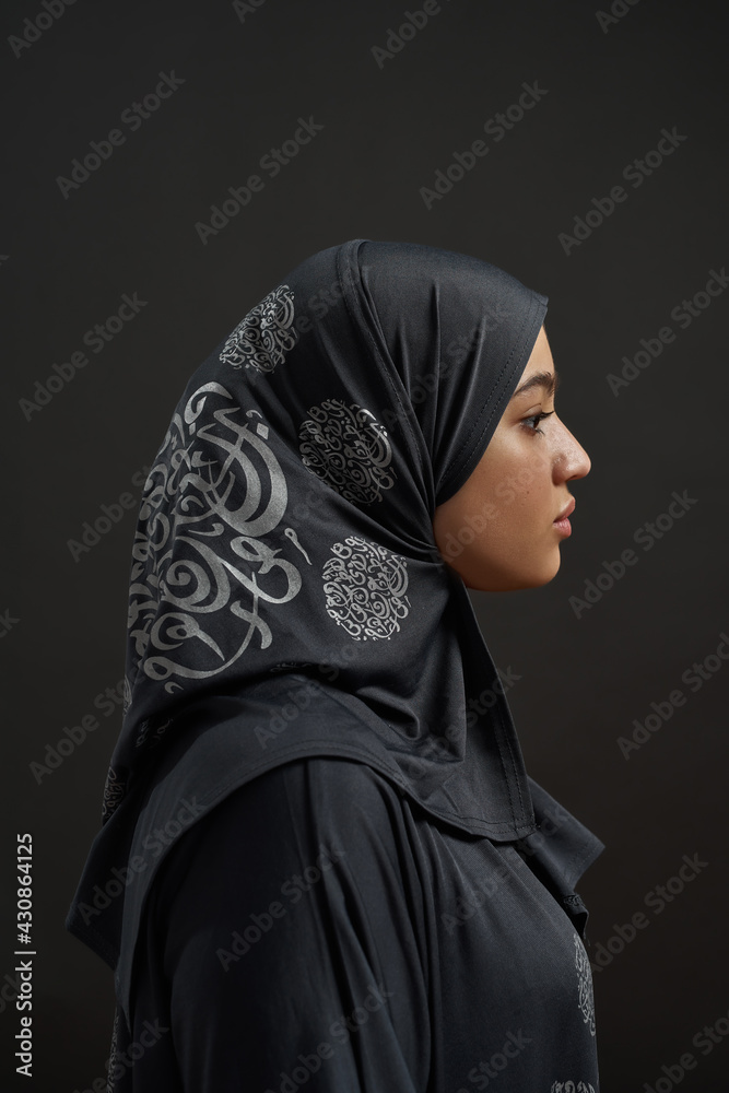 Canvas Prints Profile of young arabic girl in traditional hijab