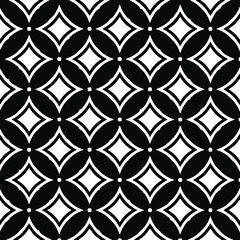 Geometric vector pattern with triangular elements. Seamless abstract ornament for wallpapers and backgrounds. Black and white colors. 