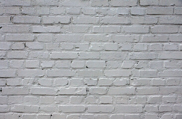 Brick wall painted in white.