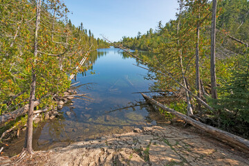 Obraz premium Narrow Lake Heading into the Wilderness