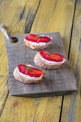 Sandwiches with cream cheese and cured salmon