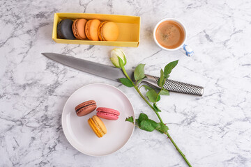 Macarons, espresso, rose, love and knife