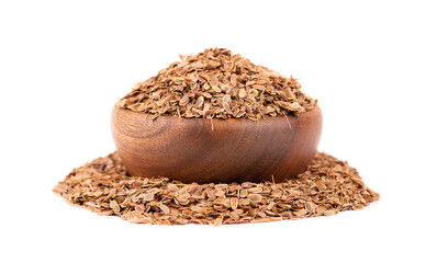 Dill seeds in wooden bowl, isolated on white background. Natural dry dill seeds. Anethum graveolens.