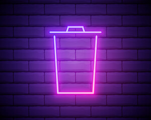 Glowing neon line Trash can icon isolated on brick wall background. Garbage bin sign. Recycle basket icon. Office trash icon. Vector Illustration