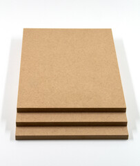 Three boards of raw MDF.