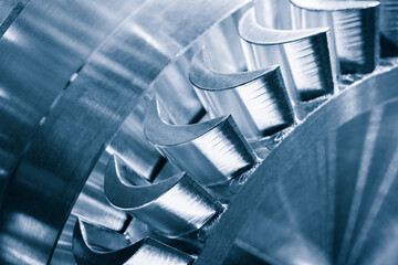 Steel blades of turbine propeller. Close-up view. In B/W. Selected focus on foreground, engineering...