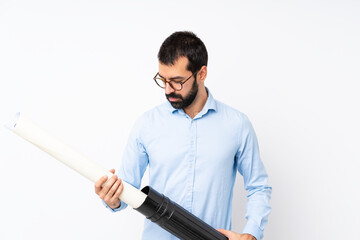 Young architect man with beard over isolated white background