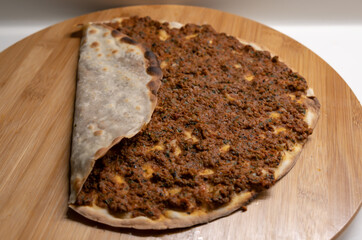 Homemade lahmacun. Turkish meal. Meat pita. Homemade food during the quarantine period.