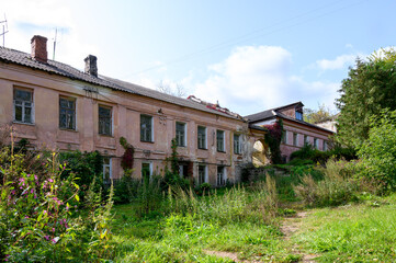 Fototapeta na wymiar Residential buildings in Aptekarsky lane Nos. 18, 16, Staritsa, Tver region, Russian Federation, September 20, 2020
