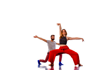 Fototapeta na wymiar Teenager dancing while doing handstand