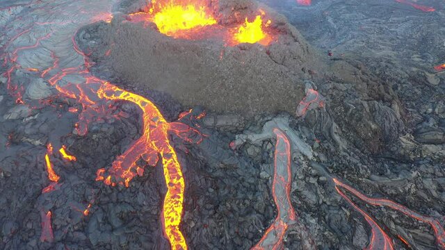 4K Drone aerial video of Iceland Volcanic eruption 2021. The volcano Fagradalsfjall is located in the valley Geldingadalir close to Grindavik and Reykjavik. Hot lava and magma coming out of the crater