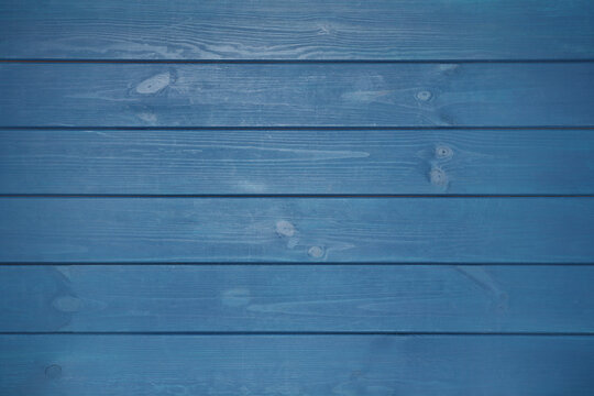 Texture of blue wooden surface as background, top view