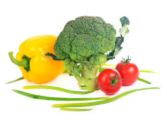 cabbage broccoli with tomatoes and green leaves isolated on white background.