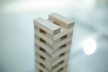 Blocks wood game jenga on white background.