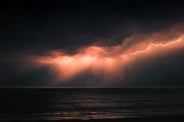 Fototapeta na wymiar Lighting Storm over Ocean