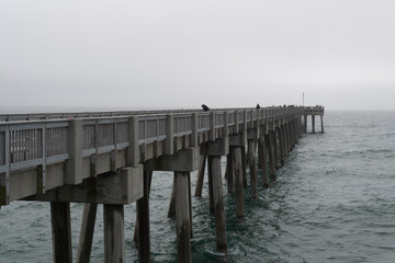 Fototapeta na wymiar Bad weather on fishing pier.