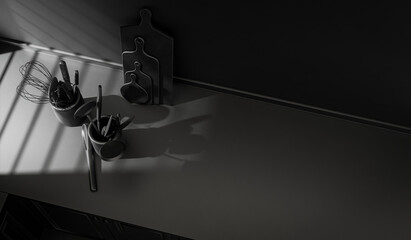 Monochrome black kitchen and countertop everyday utensils on it in warm morning sunlight.  Flat dark color and from top view scene, 3d Rendering. Morning Shine