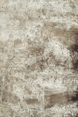 Background texture. Aged concrete surface with white paint residues. Top view. Copy space. Vertical