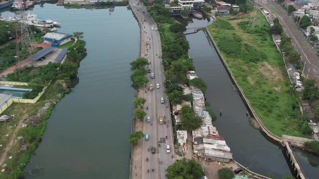Aerial view of papango Drive traffic along jakarta River, riverfront tanjung priuk. 