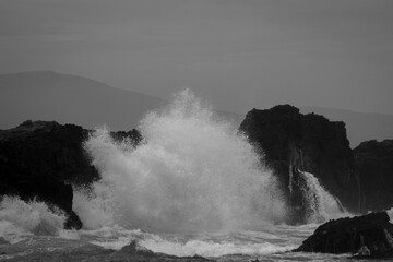 waves crashing on rocks