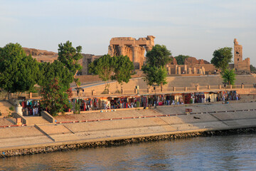 Temple of Kom Ombo from Nile River with riverside market place, Kom Ombo, Aswan, Egypt 
