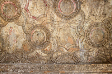 Close up of bathhouse ceiling in Pompeii, Italy 