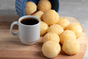 Brazilian cheese bread (pão de queijo) and black coffee .