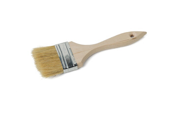 Rough paint brush with wooden handle isolated on white background.