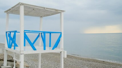 View of rescue tower on seashore. Due to covid-19 quarantine, beach is empty and there is no one, no one is swimming.