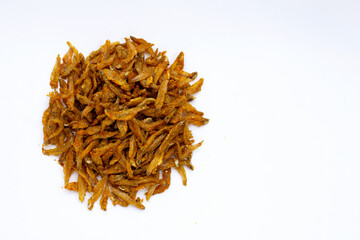 Fried anchovies on white background.