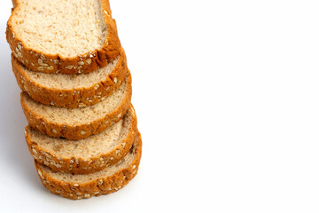 Sliced whole wheat bread on white background.