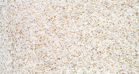 Close up shot of raw rice background.
