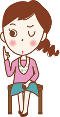 椅子に座って指を立てる若い女性。ー