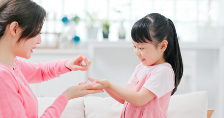 Mom teach child wash hands