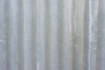 The texture of the old gray wavy slate pavement. Slate roof. Weathered surface. Grey colour. Retro style. Background image.