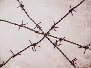 Abstract vintage picture with a barbed wire fence link