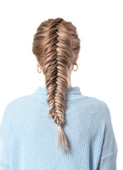 Beautiful young woman with braided hair on white background