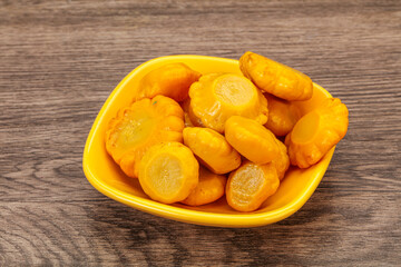 Marinated yellow patisson in the bowl