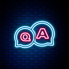 Glowing neon line Speech bubbles with Question and Answer icon isolated on brick wall background. Q and A symbol. FAQ sign. Chat speech bubble and chart. Colorful outline concept. Vector