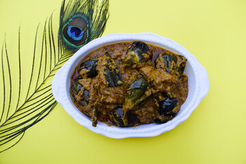 Delicious Indian brinjal curry specially made in south india known as Gutti Vankaya an Andhra party style side dish with peanut,sesame gravy. Eggplant or Aubergine stuffed masala. baingan ki sabzi © Uma