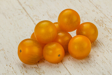 Fresh yellow cherry tomato heap