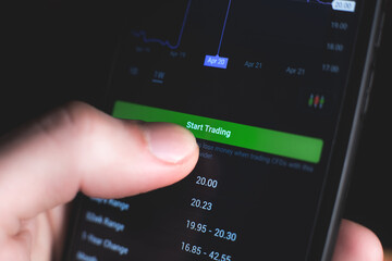 Start trading on Stock Market..Online chart of Bitcoin. Business man deal Investment. Stock Traders concept. Close up laptop screen, man Trader investor analysing Cryptocurrency  Financial Market.