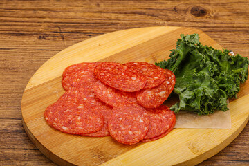 Italian spycy pepperoni sausage slices