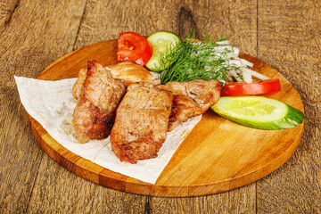 Grilled pork shashlick served vegetables